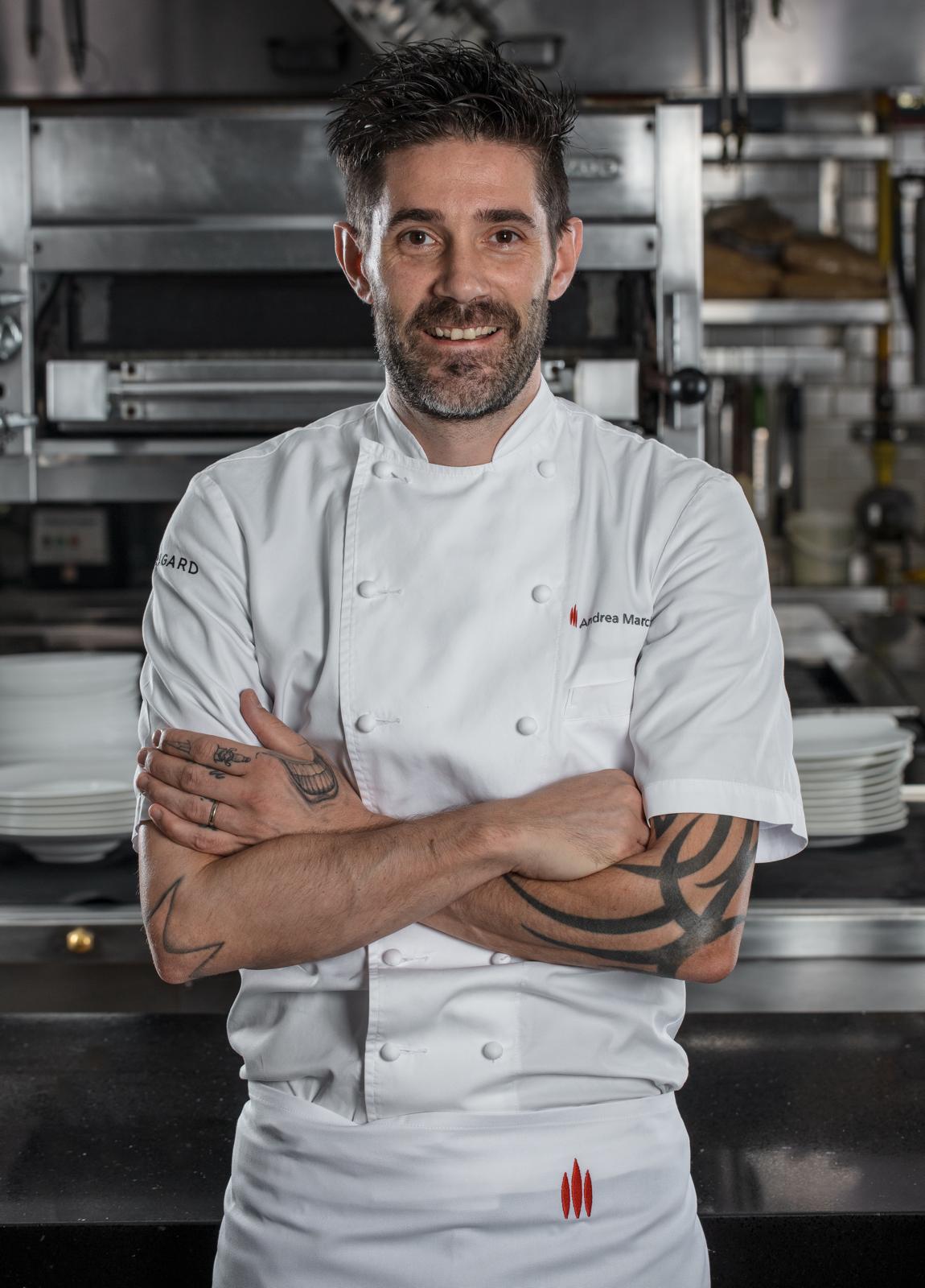 Chef Andrea Marchesin in his white chef coat